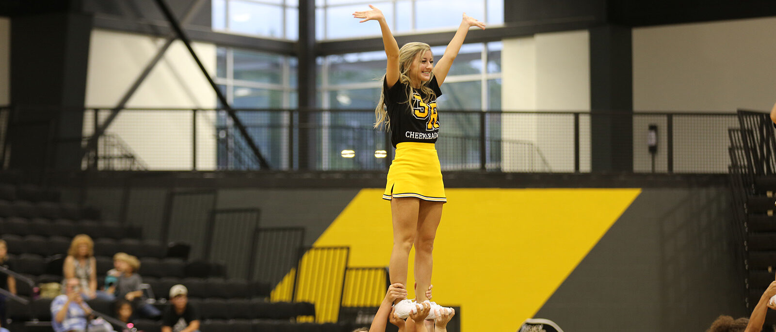 cheerleader at basketball game