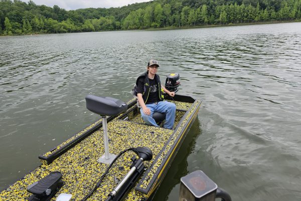 Three Rivers College students demonstrate skills by constructing a boat